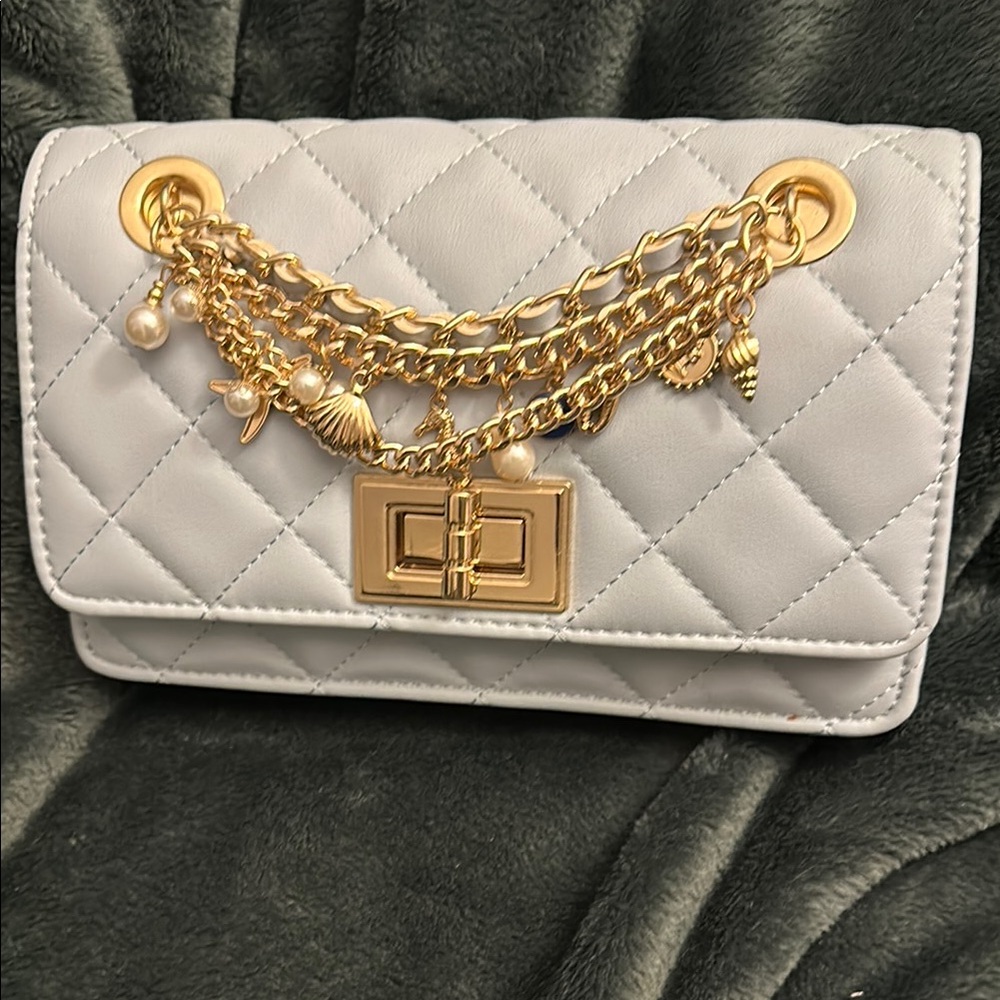 Elegant Baby Blue Quilted Handbag with Gold Chain Accents